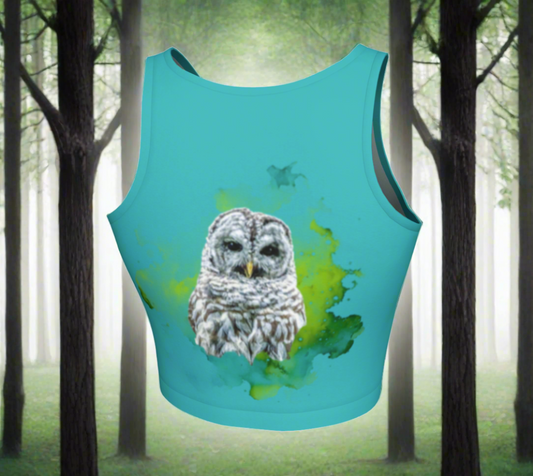 Wise owl active crop top features a barred owl with a green abstract background printed on a turquoise top.