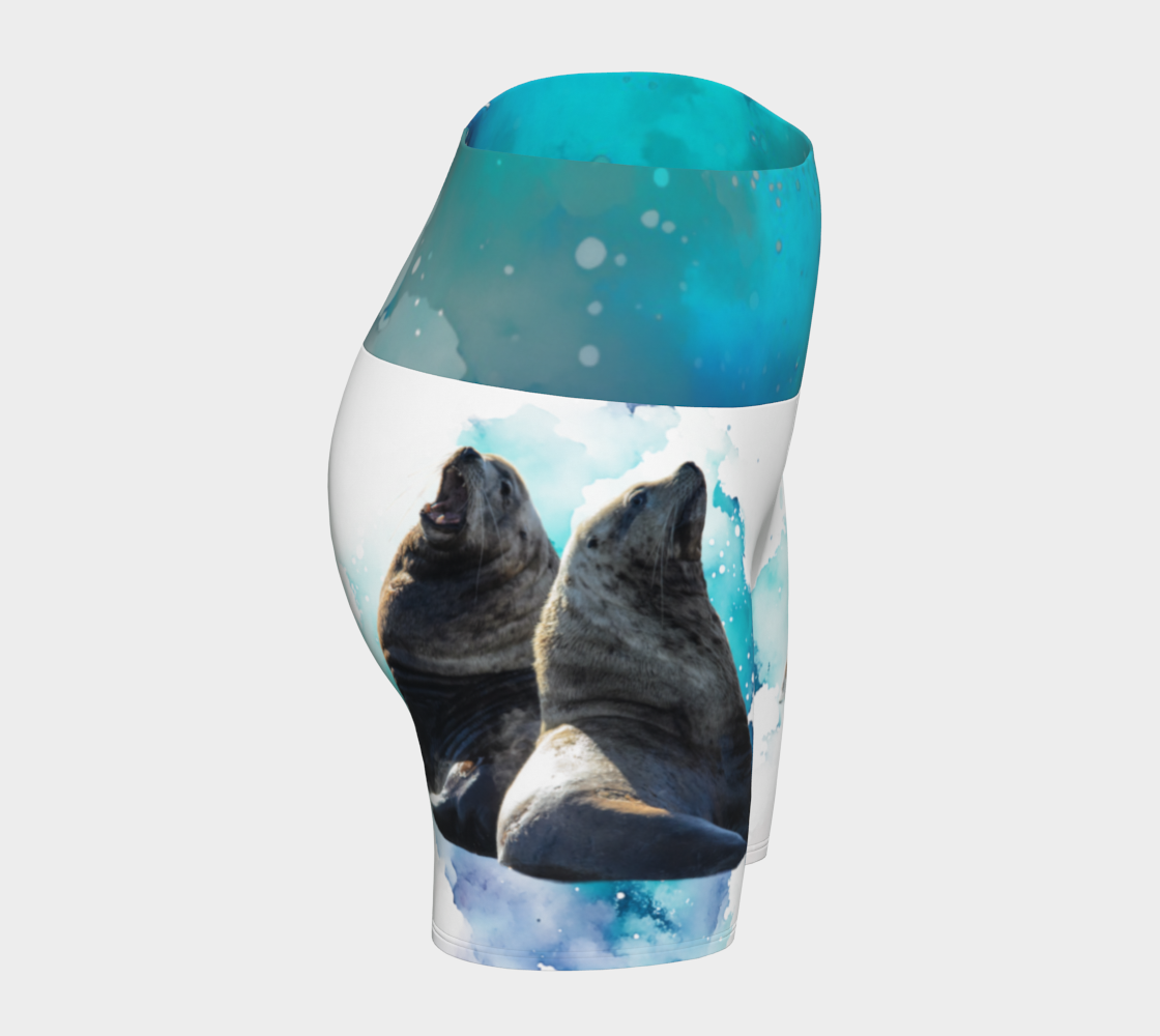 Sea Lions Communication yoga shorts features an image of two sea lions one is barking and the other is listening. The shorts are predominantly white.