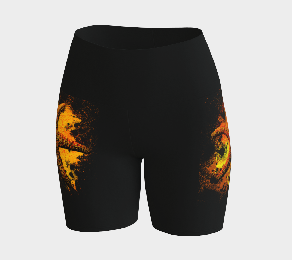 Starfish Orange Yoga Shorts features a orange starfish on a bed of abstract sand on black shorts.