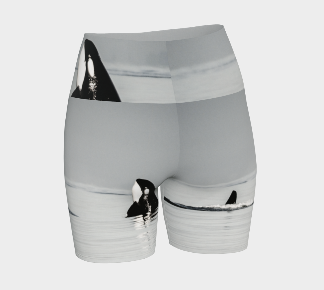 Orca Spy Hop Yoga Shorts is all over printed with a image of a orca in the spy hop position which is where they hover out of the water to look around.
