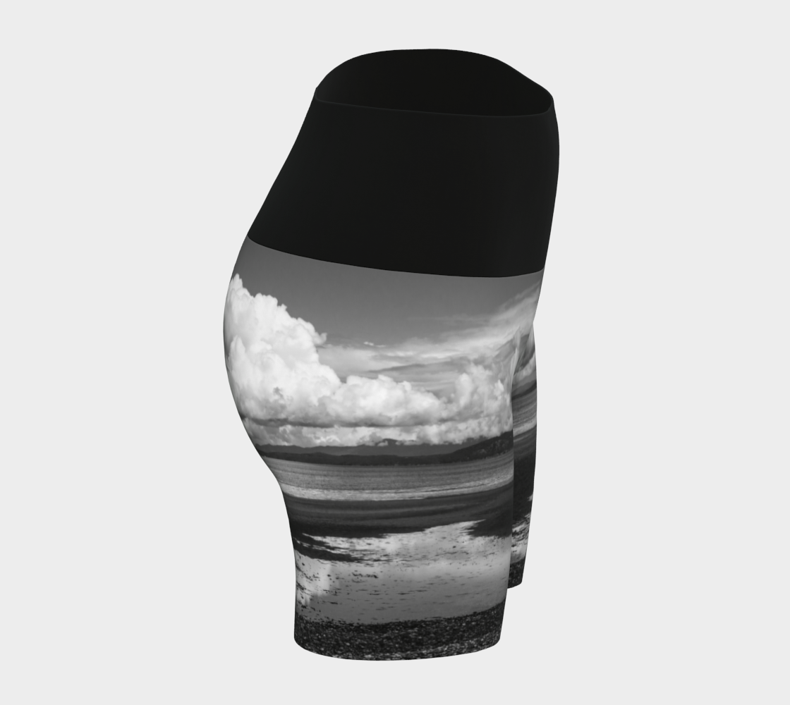Parksville beach yoga shorts feature an all over print on the bottom of the yoga short of Parksville Beach at low tide. The waistband is black.