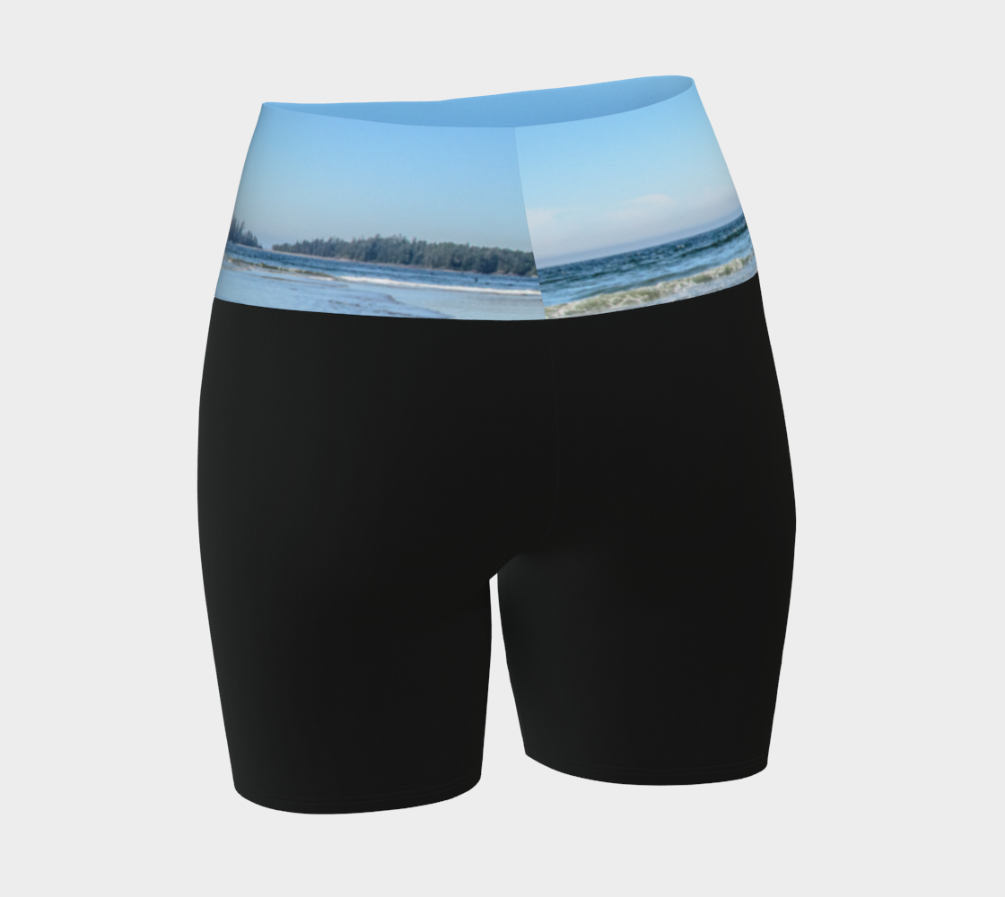 Lovekin rock long beach tofino image is printed on the waist band of the yoga shorts. The rest of the shorts is black.
