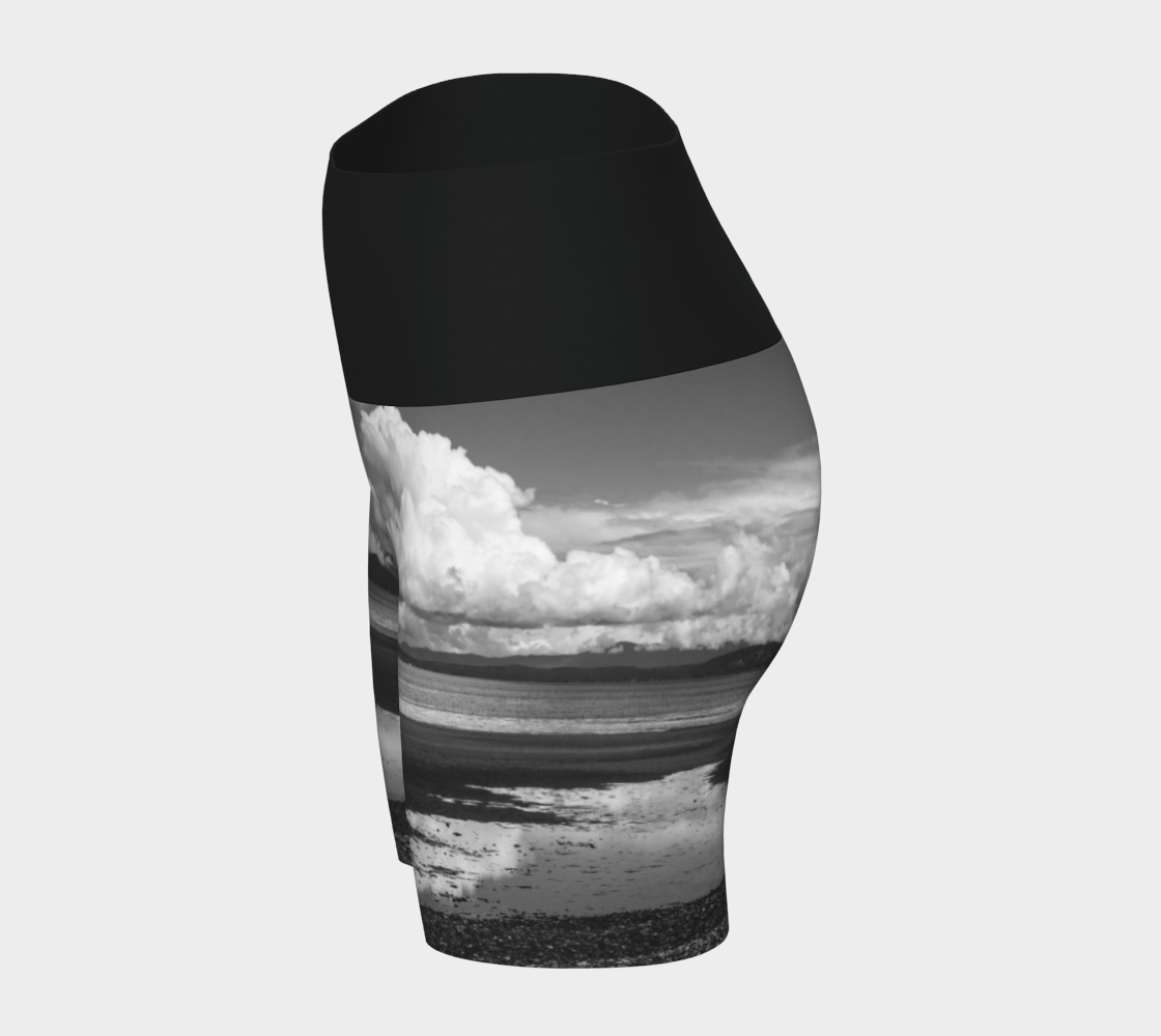 Parksville beach yoga shorts feature an all over print on the bottom of the yoga short of Parksville Beach at low tide. The waistband is black.