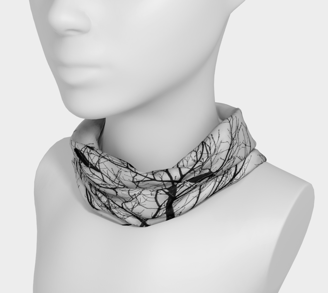 headband neck gaiter with a image of a tree with several crows in it. Black and white.