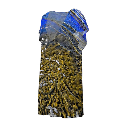 All over print beach dress features image of the sand at low tide with the blue sky reflecting in the ocean water.