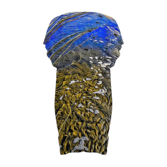 Back side of the All over print beach dress features image of the sand at low tide with the blue sky reflecting in the ocean water.