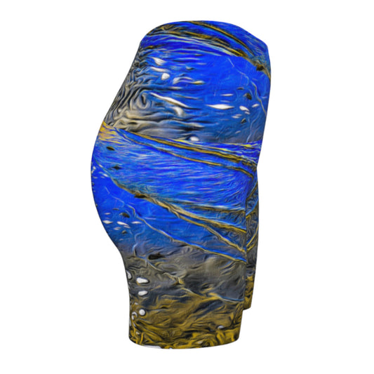 Right Side Ebb and Flow All over print yoga shorts. The shorts feature a image of the ocean water at low tide on Parksville Beach. the blue sky and the sun is reflecting on the water as the waves gently ripple across the sand. A painterly effect was added to create a artistic effect.