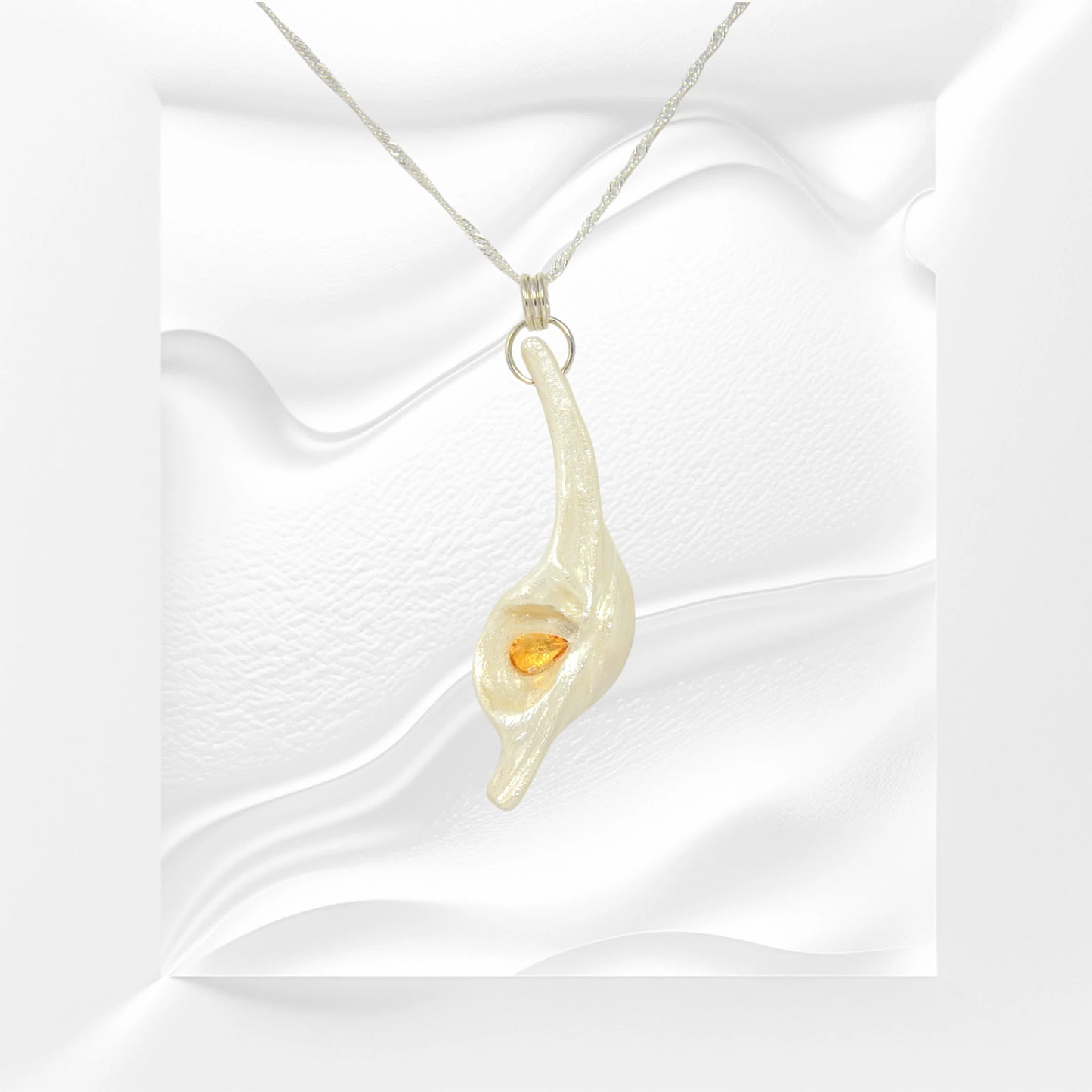 Sun Star natural seashell pendant with a beautiful pear shaped rose cut Citrine.