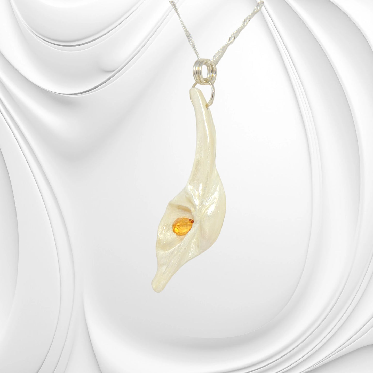 Sun Star natural seashell pendant with a beautiful pear shaped rose cut Citrine.