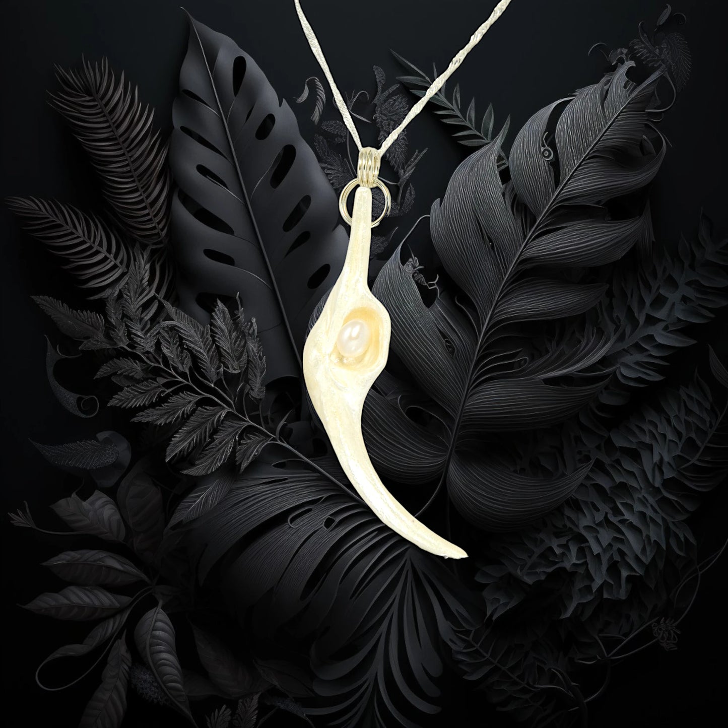Jupiter is a natural seashell pendant with a real freshwater pearl.
