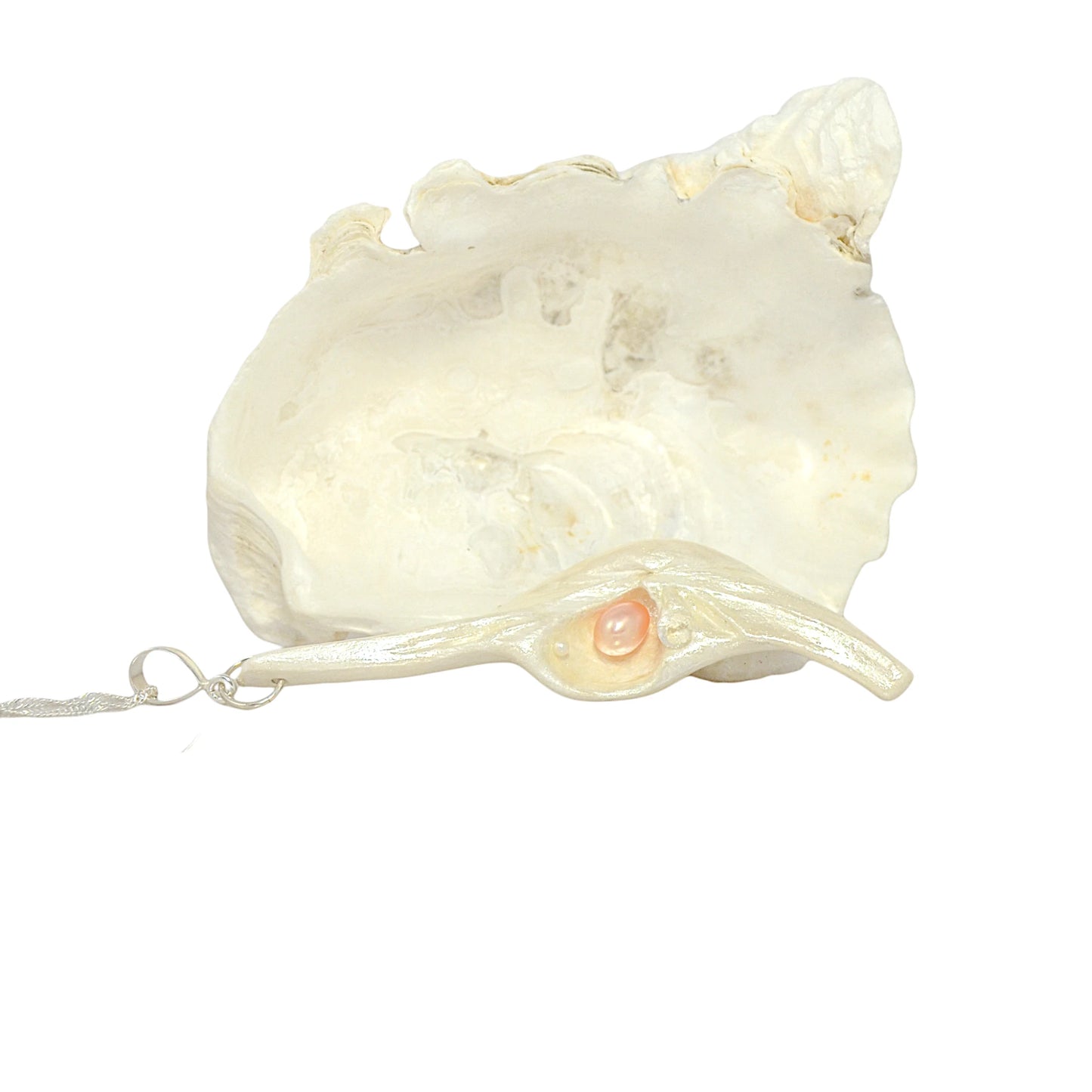 Nefertiti natural seashell and a real 8 mm pink freshwater Pearl, a baby pearl and a 5mm faceted Herkimer diamond compliments the pendant.