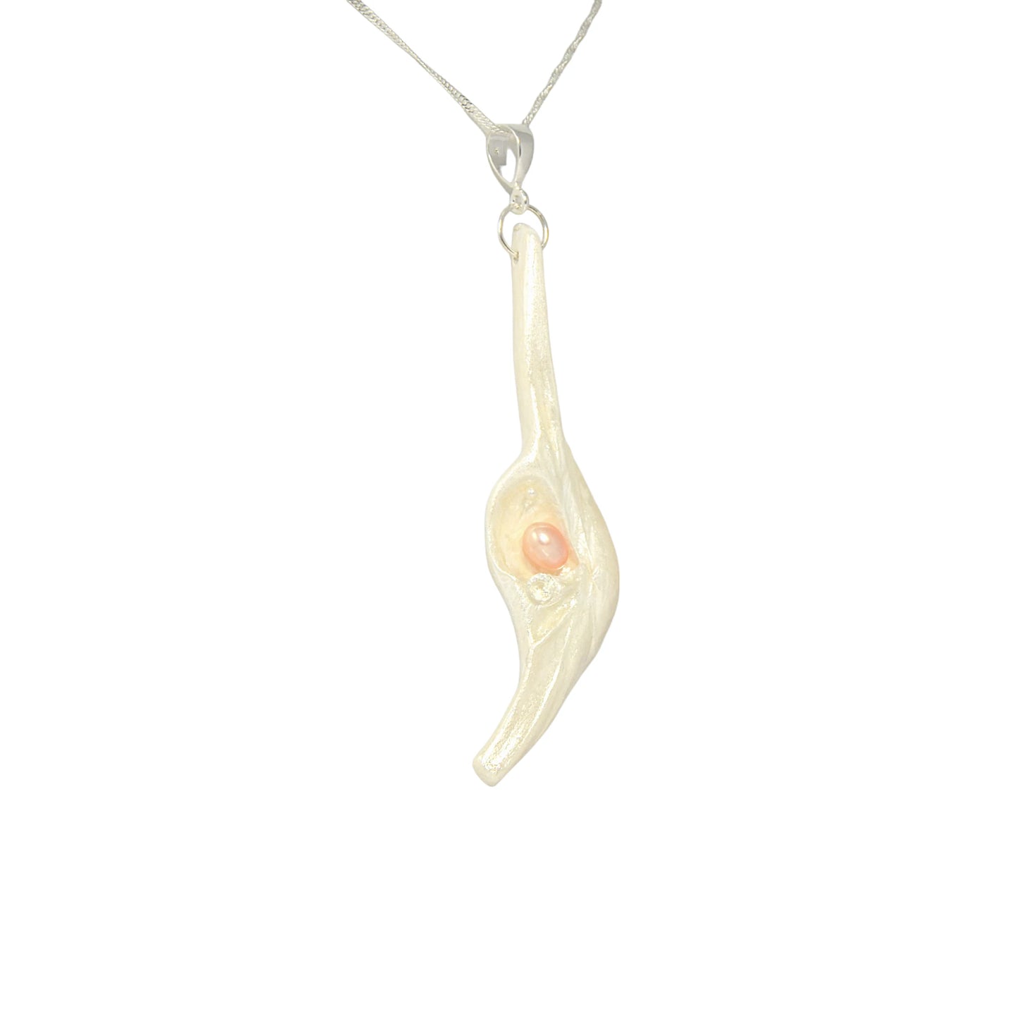Nefertiti natural seashell and a real 8 mm pink freshwater Pearl, a baby pearl and a 5mm faceted Herkimer diamond compliments the pendant.