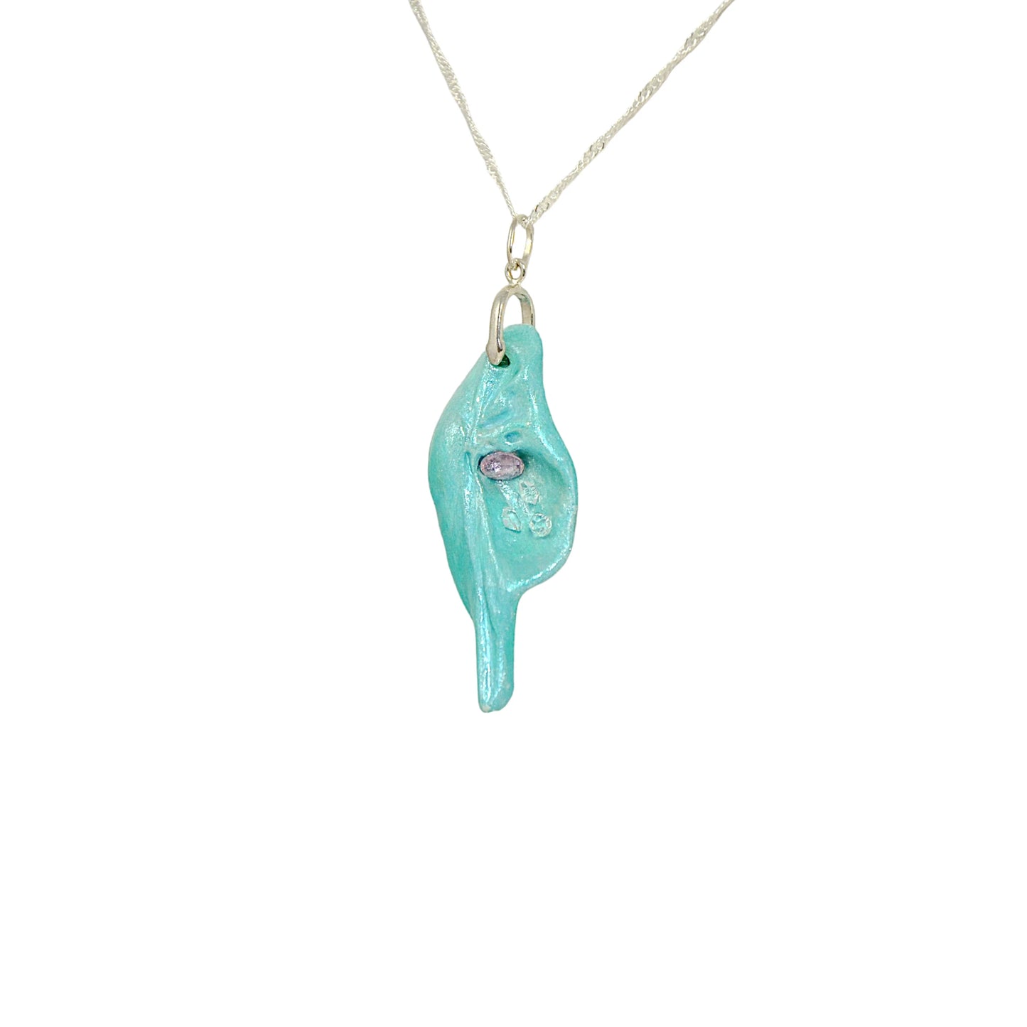 Violet Light is a natural seashell pendant with a rose cut Amethyst Gemstone and three Herkimer diamonds.