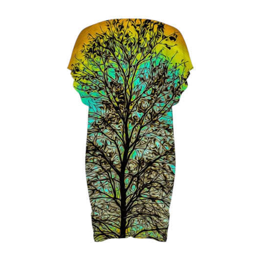 All over print dress with a print of a tree with the sun setting behind it.