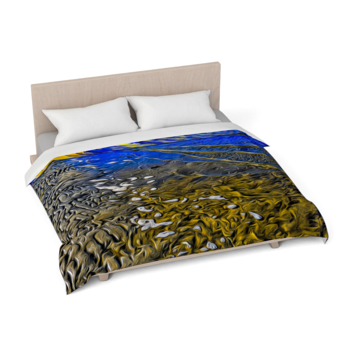 A bed dressed with a duvet cover featuring an abstract landscape-like print in blue, gold, black, and white, styled with two white pillows against a light wood headboard on a white background.