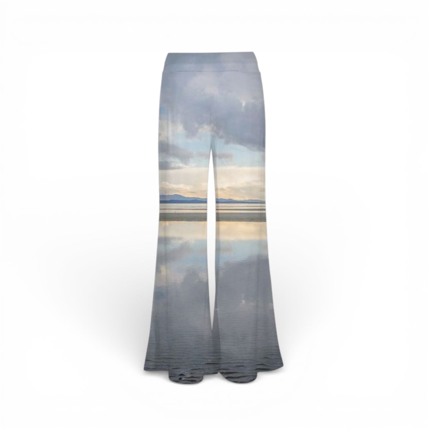 Flared pants with a scenic print on a white background