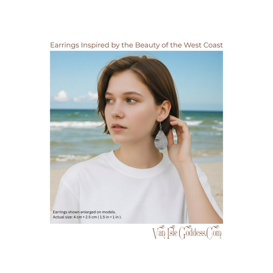 Woman wearing earrings with ocean view in the background, Van Isle Goddess Co branding.