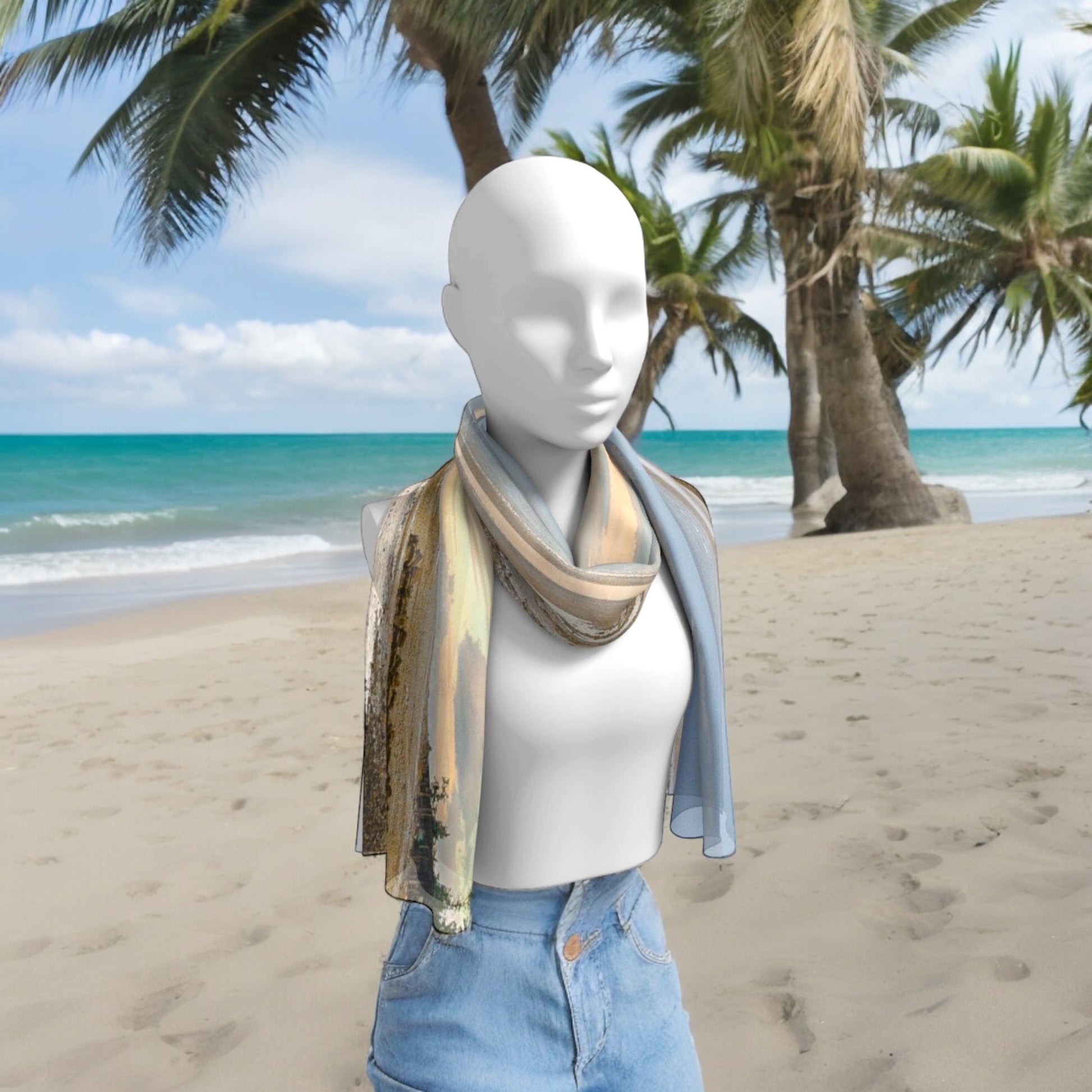 Miracle Beach Long Scarf worn around the neck of someone walking along the beach