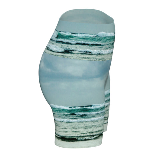 This all over printed Ocean Calling Tofino yoga shorts features an image of the waves at Long Beach Tofino.