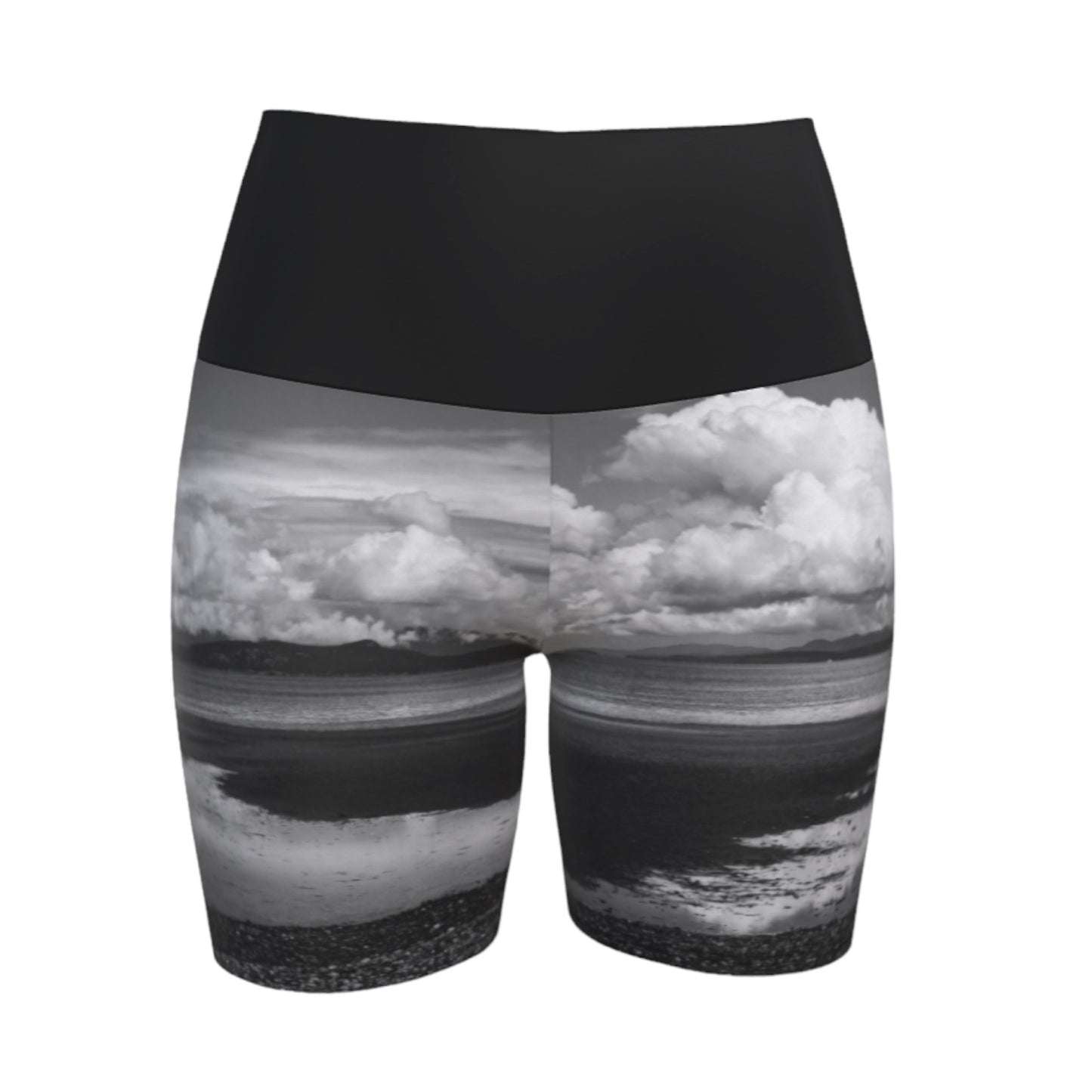Parksville beach yoga shorts feature an all over print on the bottom of the yoga short of Parksville Beach at low tide. The waistband is black.