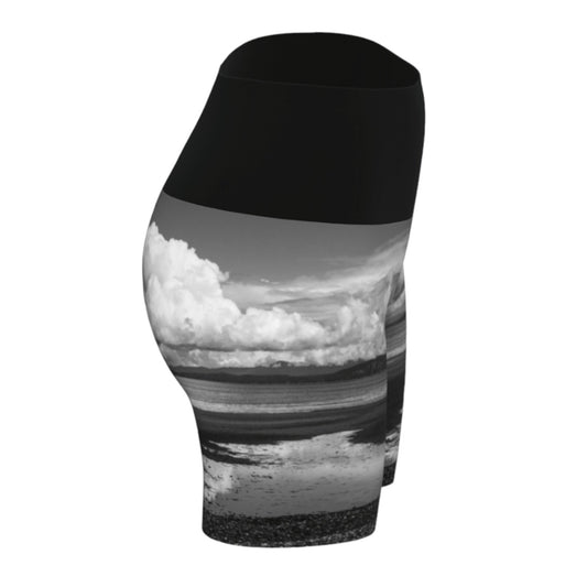 Parksville beach yoga shorts feature an all over print on the bottom of the yoga short of Parksville Beach at low tide. The waistband is black.