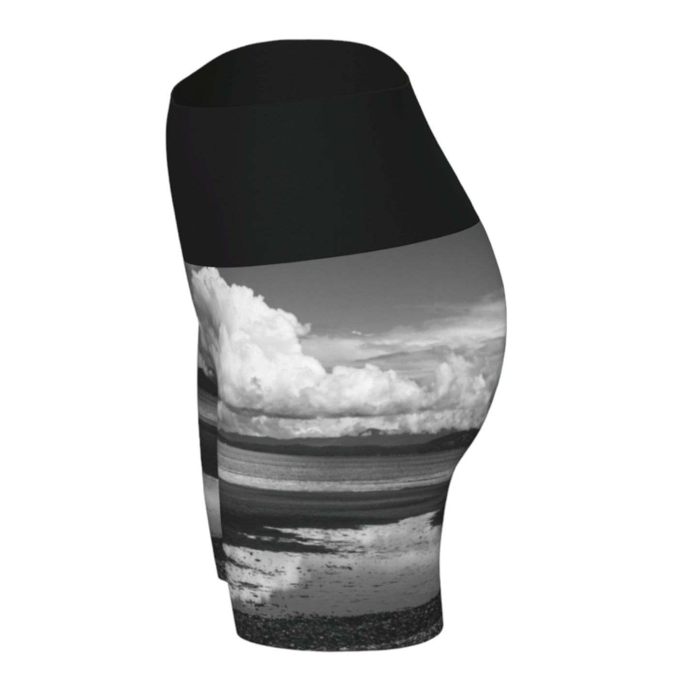Parksville beach yoga shorts feature an all over print on the bottom of the yoga short of Parksville Beach at low tide. The waistband is black.