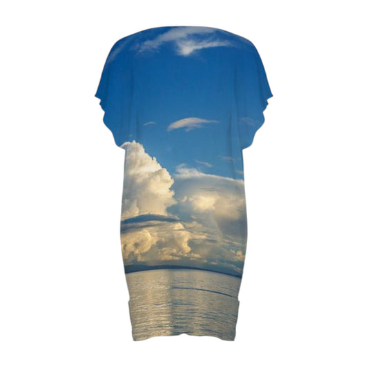 Back side All over print dress with a image of beach ocean and big clouds.
