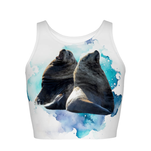 Sea Lions Communication Active Crop Top. The image on the top is of two sea lions talking to one another. The image is on a blue turquoise abstract background on a white top.