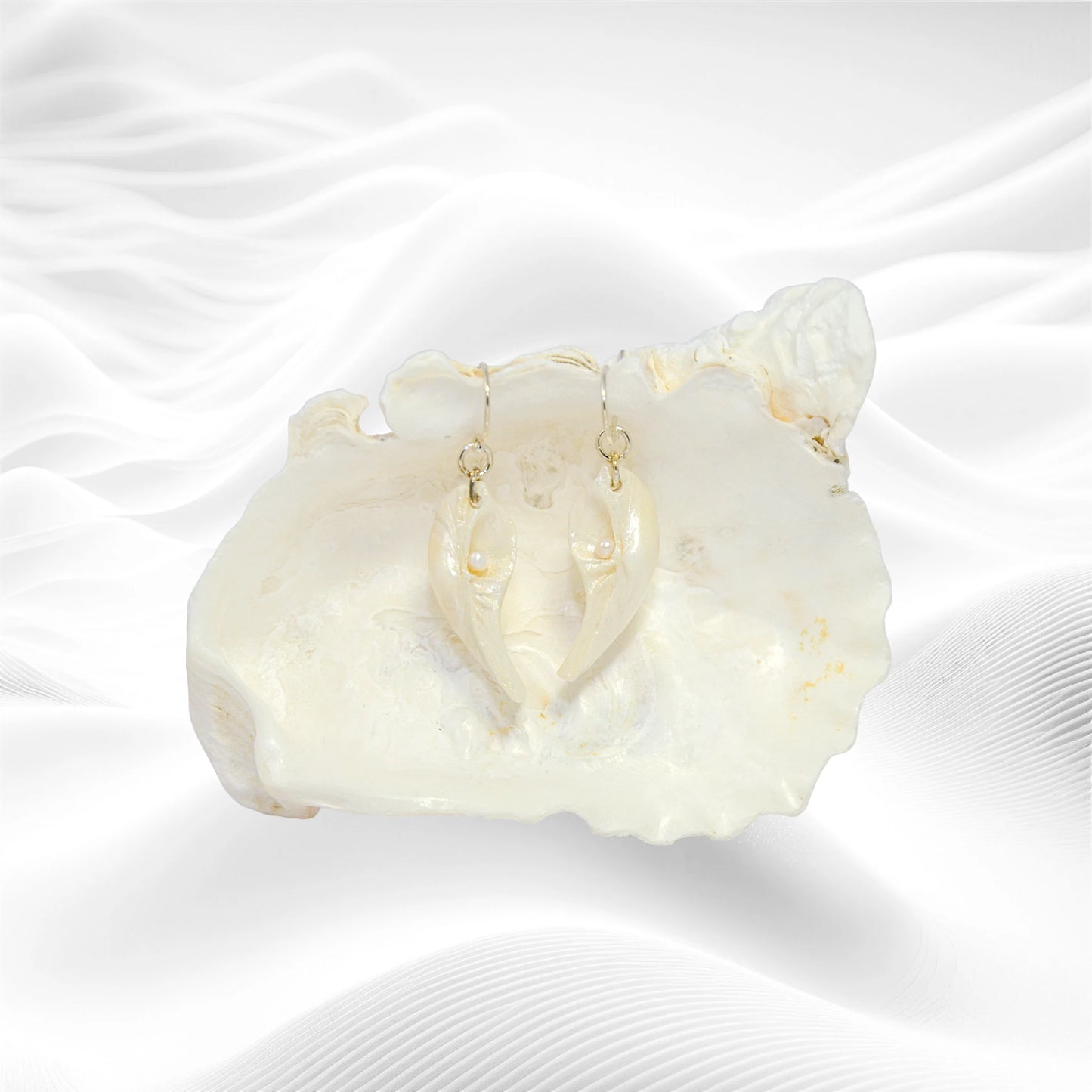 Seraphina natural seashell earrings with real baby freshwater pearls.