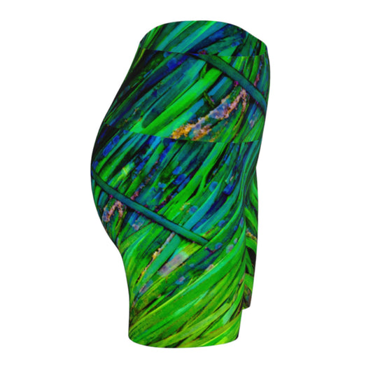Shades of green yoga shorts feature an all over print of spring ocean sea grass at low tide.