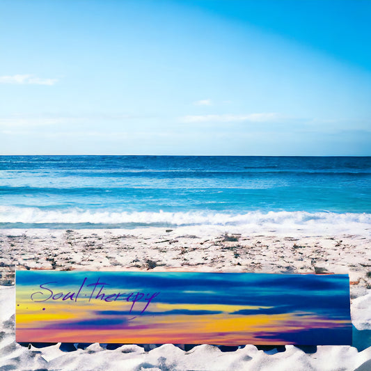 Soul therapy long scarf shown full length on a beach.