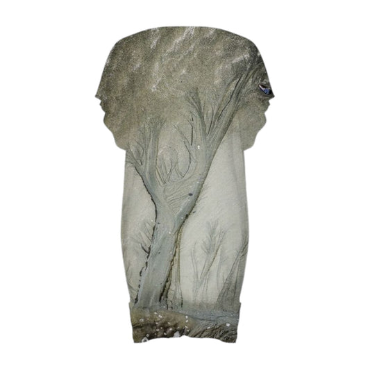 Back side All over print beach dress image is of trees made in the sand.