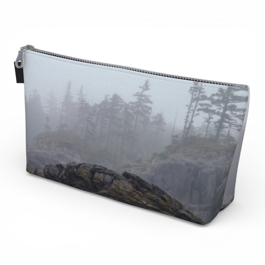 Pouch with a nature-themed design of trees and rocks on a white background
