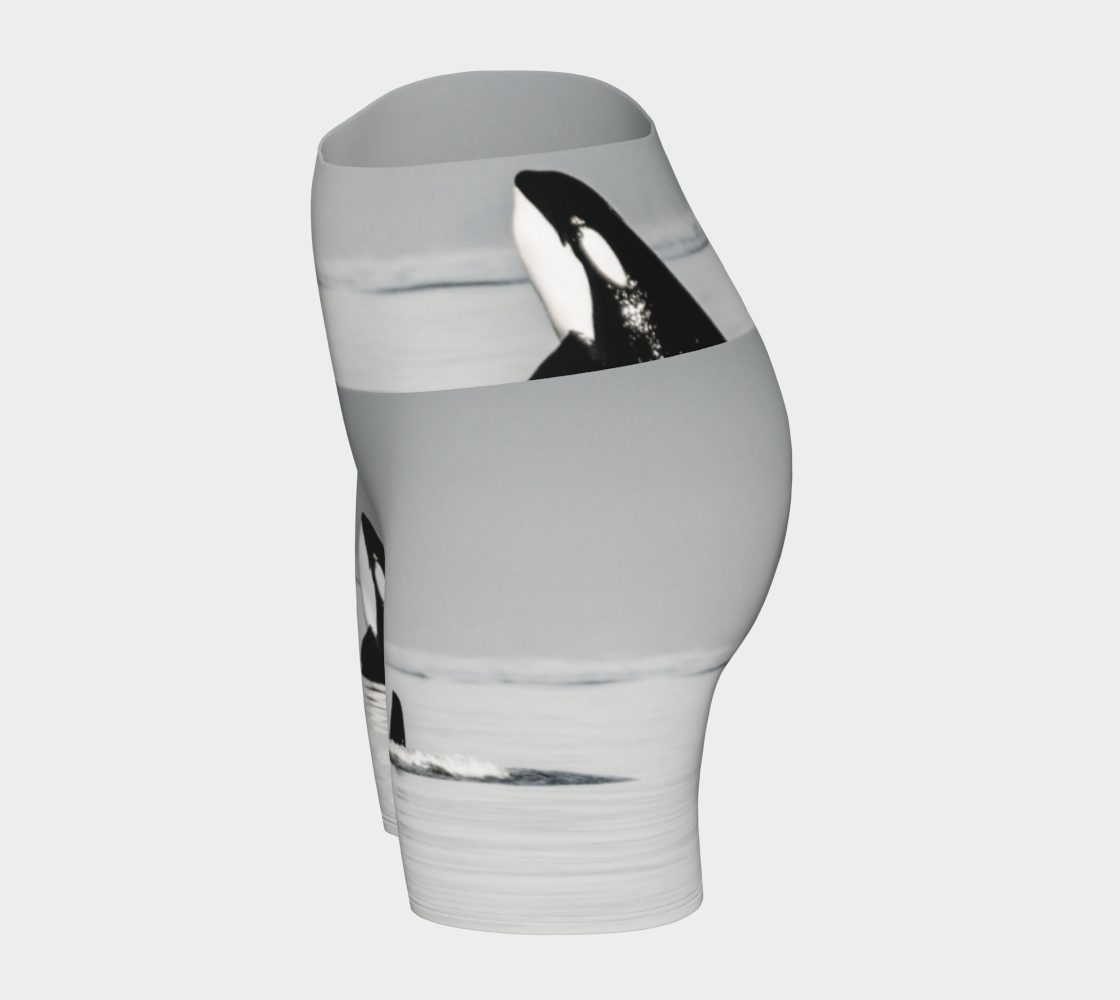 Orca Spy Hop Yoga Shorts is all over printed with a image of a orca in the spy hop position which is where they hover out of the water to look around.
