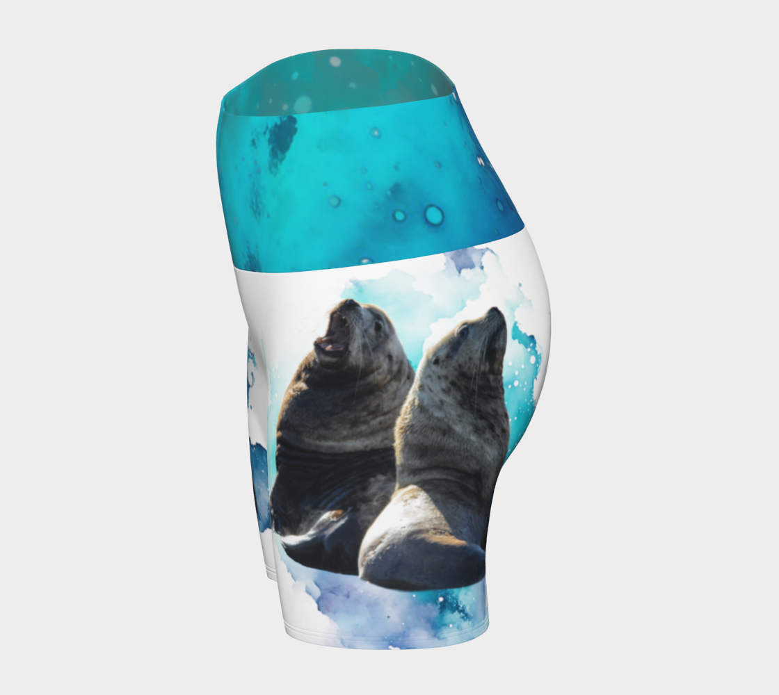 Sea Lions Communication yoga shorts features an image of two sea lions one is barking and the other is listening. The shorts are predominantly white.