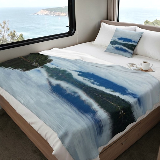 Van Isle Goddess Alberni Inlet Coastal Blanket featuring a serene lake reflecting misty mountains and evergreen trees.