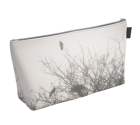Protected makeup Bags featuring printed artwork by Roxy Hurtubise.