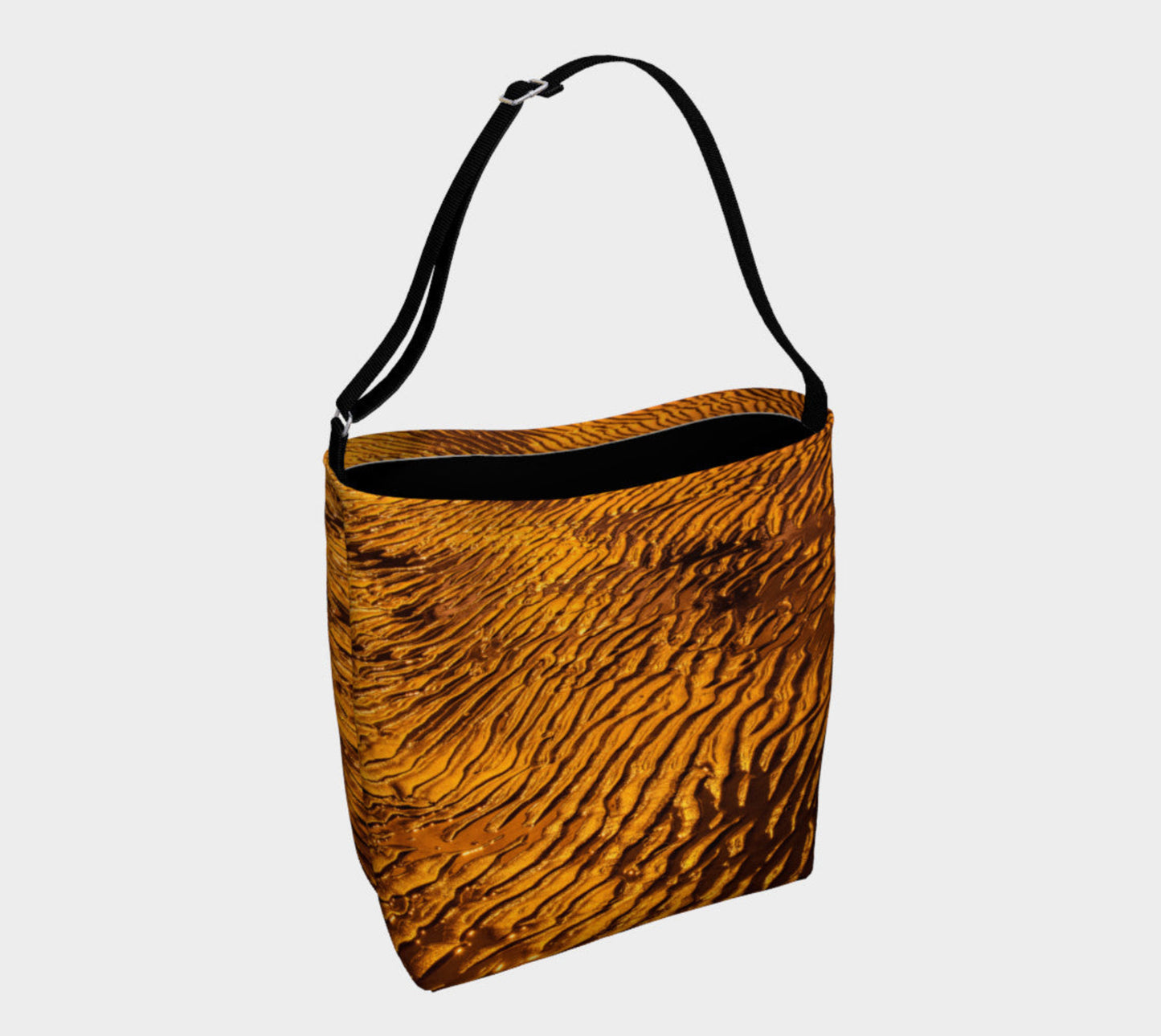 Golden Sand Day Tote Everyday Day Tote for Everything! Van Isle Goddess ultimate tote bag! Adjustable strap for comfort, the tote is made from soft and supple neoprene that stretches to fit whatever you can put in it! Vibrant artwork that will never fade with washing. Golden Sand Artwork by Roxy Hurtubise with golden sand artwork printed on the bottom interior with a black band on the interior top.