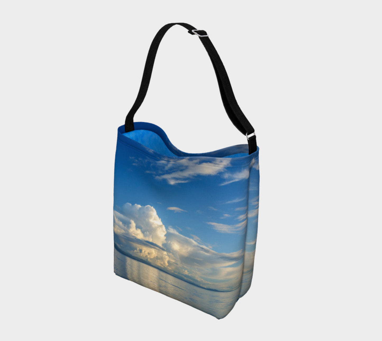 Everyday Day Tote for Everything! Van Isle Goddess ultimate tote bag! Adjustable strap for comfort, the tote is made from soft and supple neoprene that stretches to fit whatever you can put in it! Vibrant artwork that will never fade with washing. Qualicum Beach Artwork by Roxy Hurtubise with ocean waves interior.
