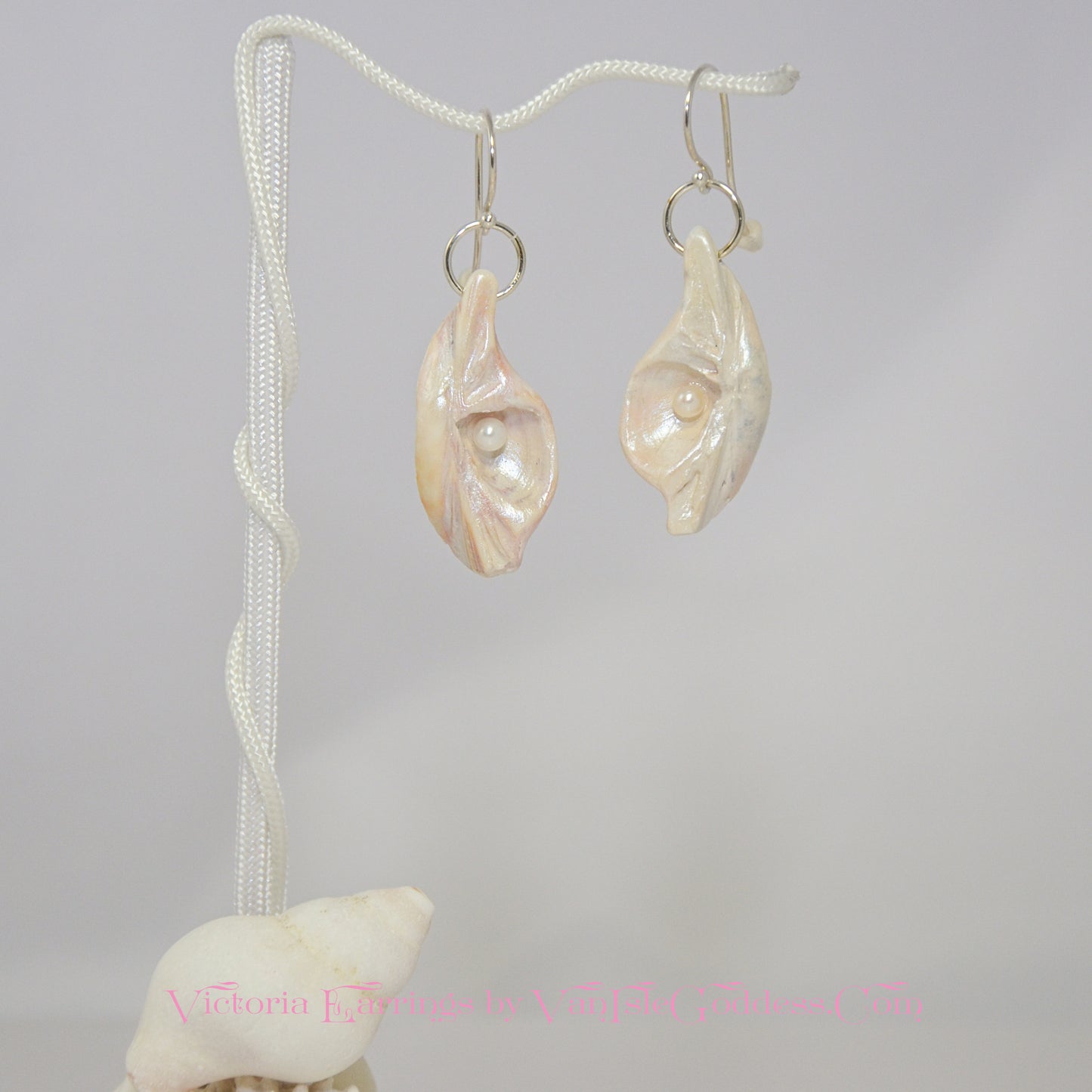 Victoria natural seashell earrings with real baby freshwater pearls.