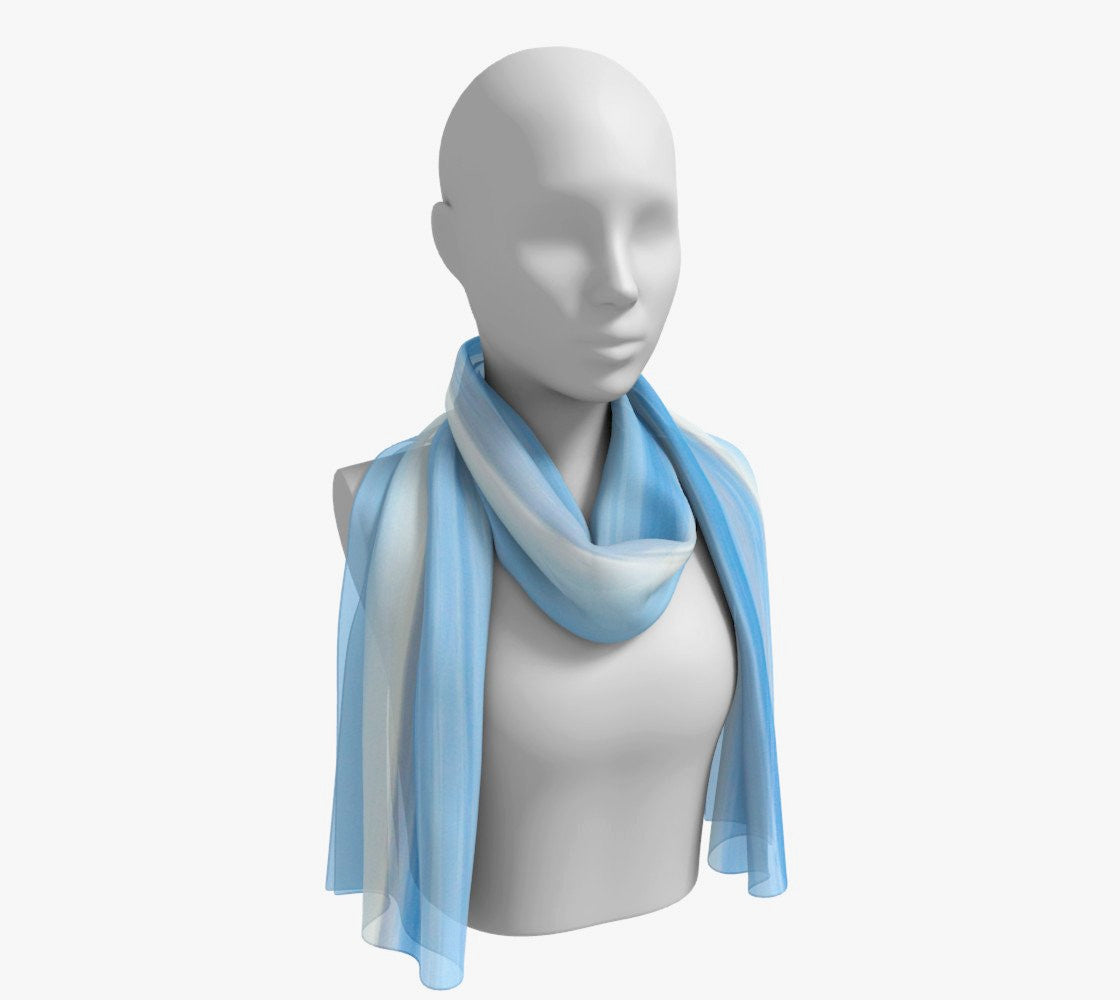 Ocean Blue Long Scarf Wear as a scarf, shawl or as a head wrap. Use for home decor as a wall hanging, also makes fabulous Wedding Party Gifts! Artwork printed on 100% polyester lightweight fabric. Choose from three different fabrics polychiffon, satin charmeuse and matte crepe. Machined baby rolled edge hem finish. Choose from 2 sizes: 10" x 45" 16" x 72" by Roxy Hurtubise vanislegoddess.com