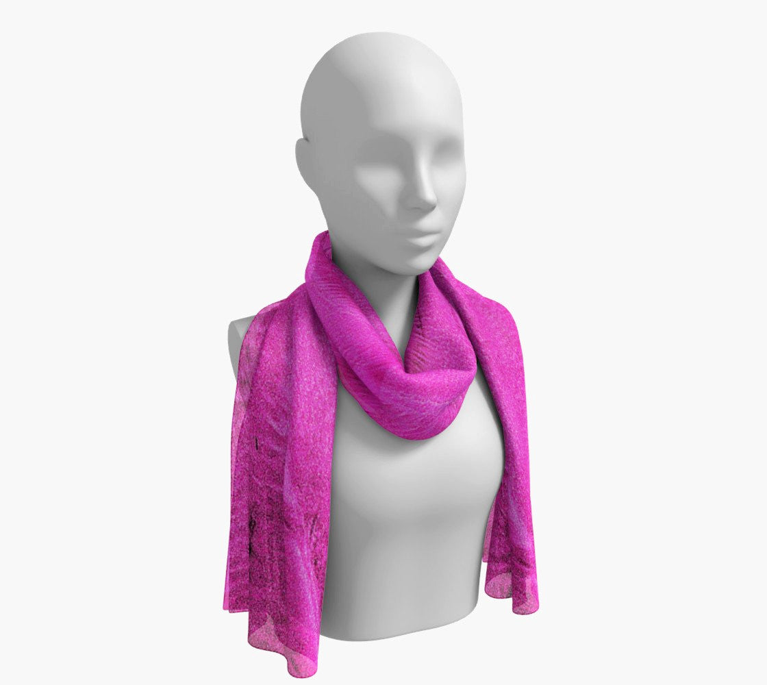 Pink Sand Long Scarf Wear as a scarf, shawl or as a head wrap. Use for home decor as a wall hanging, also makes fabulous Wedding Party Gifts! Artwork printed on 100% polyester lightweight fabric. Choose from three different fabrics polychiffon, satin charmeuse and matte crepe. Machined baby rolled edge hem finish. Choose from 2 sizes: 10" x 45" 16" x 72" by Roxy Hurtubise vanislegoddess.com