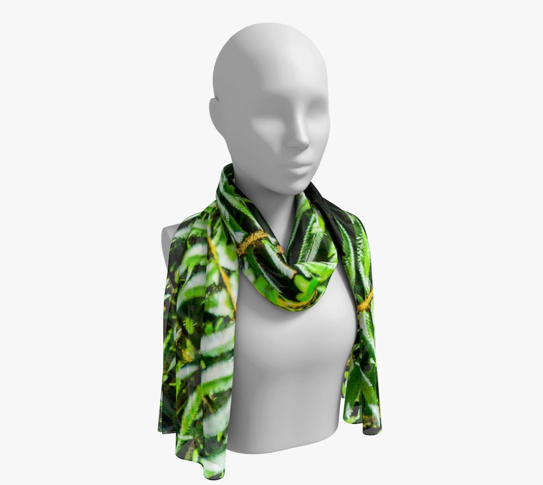 Rainforest Long Scarf Wear as a scarf, shawl or as a head wrap. Use for home decor as a wall hanging, also makes fabulous Wedding Party Gifts! Artwork printed on 100% polyester lightweight fabric. Choose from three different fabrics polychiffon, satin charmeuse and matte crepe. Machined baby rolled edge hem finish. Choose from 2 sizes: 10" x 45" 16" x 72" by Roxy Hurtubise vanislegoddess.com