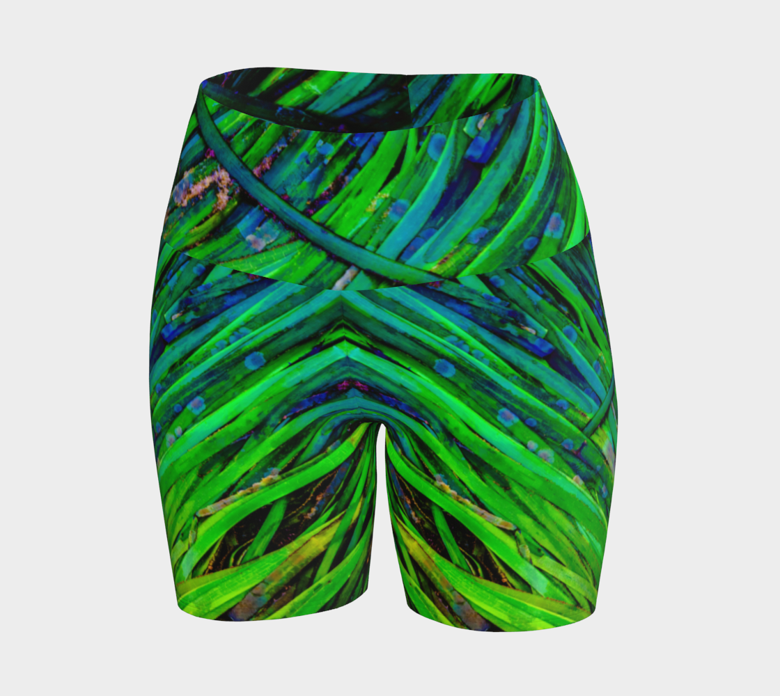 Shades of green yoga shorts feature an all over print of spring ocean sea grass at low tide.