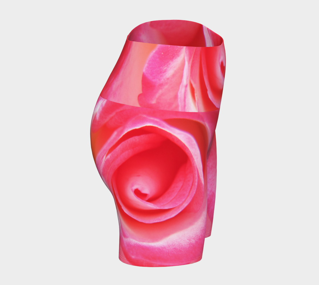 All over print Sparkle Rose Yoga Shorts features a pink rose as the image on the shorts