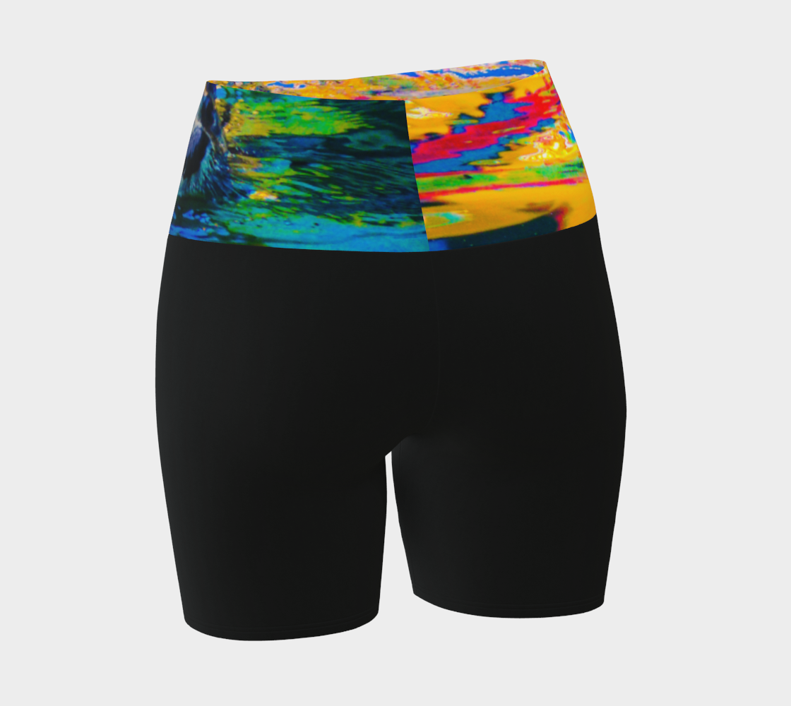 Otter Art Yoga Shorts feature a image of a sea otter printed on the waistband. The rest of the shorts are black.