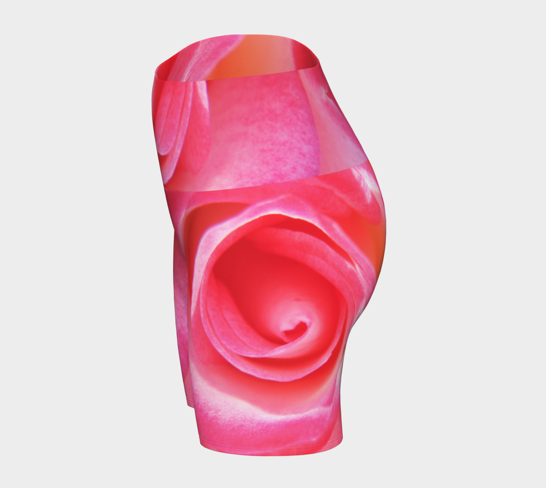 All over print Sparkle Rose Yoga Shorts features a pink rose as the image on the shorts