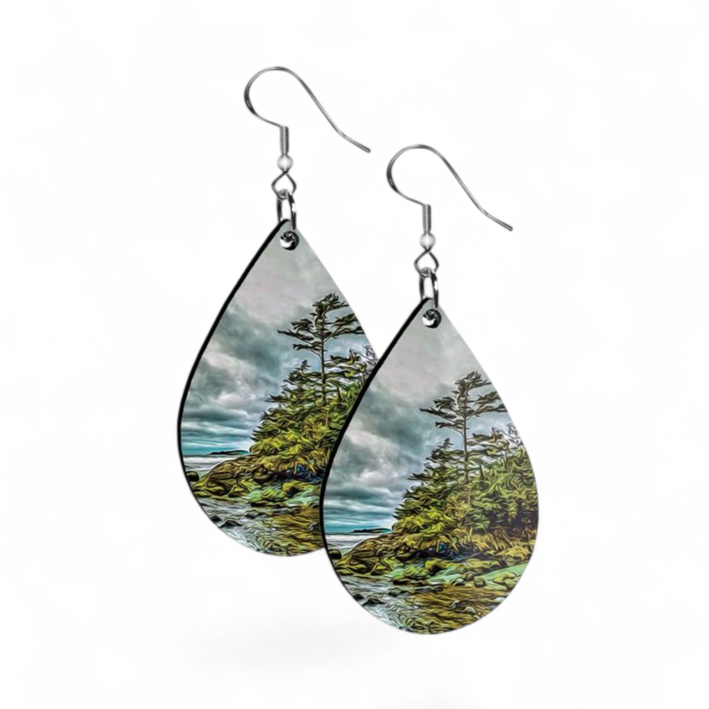 Teardrop-shaped earrings with nature-themed design on a white background