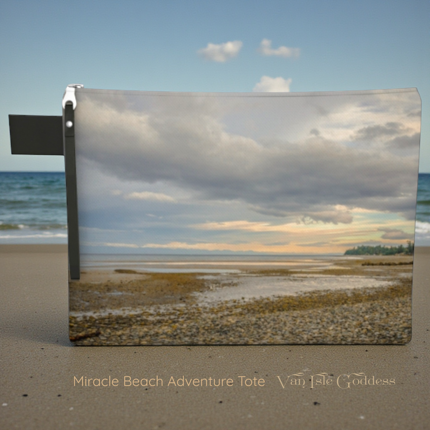 Tote bag with beach scene design on a sandy surface