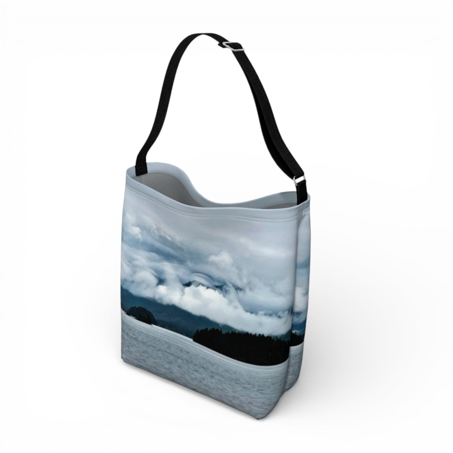 Tote bag with a design of clouds and water on a white background